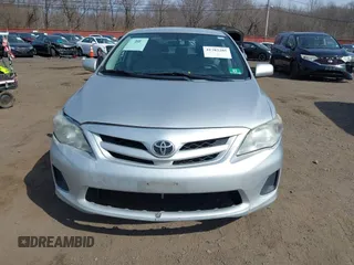 2012 Toyota Corolla L with VIN 2T1BU4EE7CC842871, listed as a IAAI auction lot 41782205 with 213,186 mi miles. Bid and sale history available at carsss.com. Image 12.
