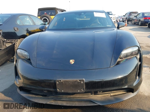 2022 Porsche Taycan z VIN WP0AA2Y10NSA11640, wystawiony jako IAAI lot #41215410 z przebiegiem 25 749 mil mil oraz . Historia ofert i sprzedaży dostępna na DreamBid. Obrazek 12.