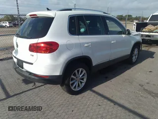 2017 Volkswagen Tiguan Wolfsburg Edition with VIN WVGRV7AXXHW509109, listed as a IAAI auction lot 42477386 with 77,645 mi miles and . Bid and sale history available at DreamBid. Image 4.