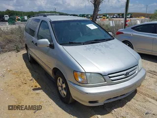 2002 Toyota Sienna LE z VIN 4T3ZF13C32U468403, wystawiony jako IAAI lot #42144703 z przebiegiem 211 578 mil mil oraz . Historia ofert i sprzedaży dostępna na DreamBid. Obrazek 1.