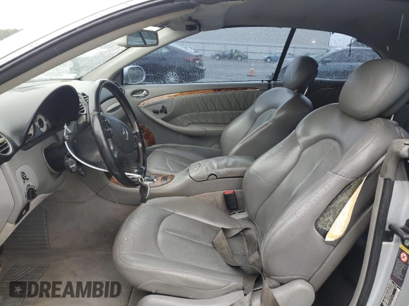 2006 Mercedes-Benz CLK-Class 5.0L with VIN WDBTK75G66T057024, listed as a Copart auction lot 71593374 with 166,447 mi miles and Salvage Title. Bid and sale history available at carsss.com. Image 7.