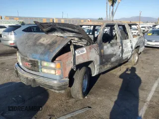 1994 GMC Suburban z VIN 1GKEC16K3RJ769051, wystawiony jako Copart lot #74576864 z przebiegiem Nie podano mil oraz Nie do naprawy • Non repairable. Historia ofert i sprzedaży dostępna na DreamBid. Obrazek 1.