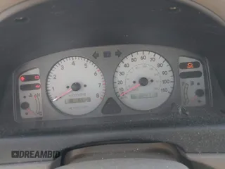 1999 Toyota Corolla VE z VIN 1NXBR18E6XZ225512, wystawiony jako IAAI lot #41842023 z przebiegiem 324 718 mil mil oraz . Historia ofert i sprzedaży dostępna na DreamBid. Obrazek 7.
