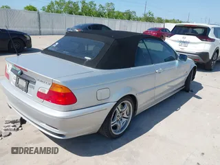 2001 BMW 3 Series 330Ci with VIN WBABS53431EV86967, listed as a IAAI auction lot 42017677 with 198,944 mi miles. Bid and sale history available at carsss.com. Image 4.
