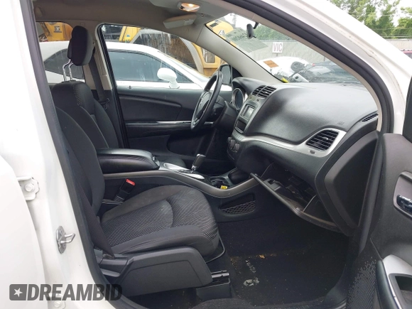 2017 Dodge Journey SXT z VIN 3C4PDCBG4HT531635, wystawiony jako IAAI lot #42460200 z przebiegiem 152 293 mil mil oraz . Historia ofert i sprzedaży dostępna na DreamBid. Obrazek 5.