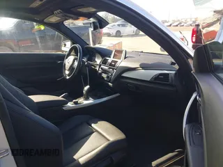 2016 BMW 2 Series 228i with VIN WBA1F9C59GV545980, listed as a IAAI auction lot 42515279 with 59,525 mi miles and . Bid and sale history available at DreamBid. Image 5.