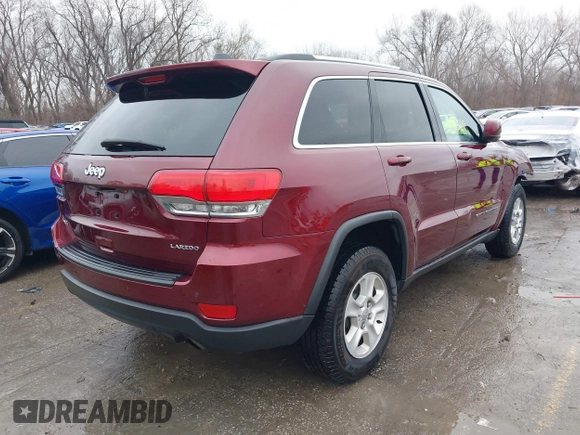 2017 Jeep Grand Cherokee Laredo with VIN 1C4RJFAG2HC682716, listed as a IAAI auction lot 41213760 with 116,519 mi miles. Bid and sale history available at carsss.com. Image 4.