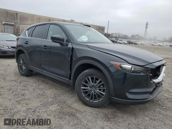 2021 Mazda CX-5 Touring with VIN JM3KFBCM7M1480336, listed as a Copart auction lot 48854415 with 51,774 mi miles and Salvage Title. Bid and sale history available at carsss.com. Image 4.