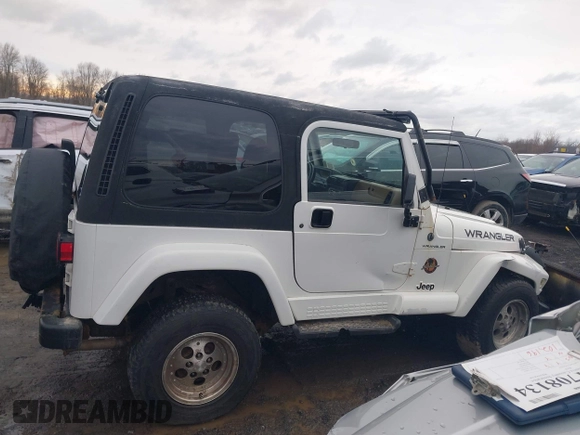 1997 Jeep Wrangler Sahara with VIN 1J4FY49S1VP503639, listed as a IAAI auction lot 41708134 with 102,196 mi miles and . Bid and sale history available at carsss.com. Image 14.