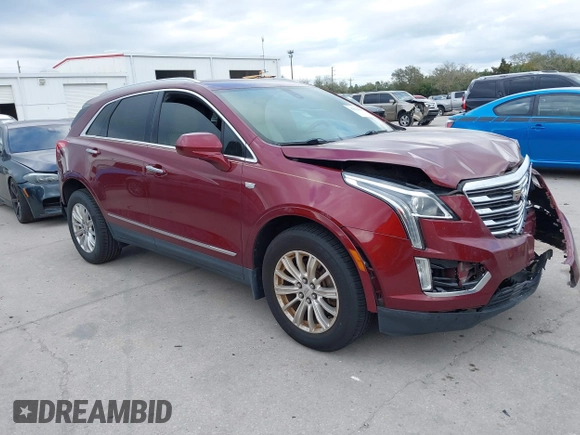 2017 Cadillac XT5 FWD with VIN 1GYKNARS2HZ107587, listed as a IAAI auction lot 41614842 with 124,611 mi miles and . Bid and sale history available at carsss.com. Image 1.