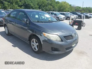 2009 Toyota Corolla z VIN JTDBL40E999078112, wystawiony jako IAAI lot #42785697 z przebiegiem 180 814 mil mil oraz . Historia ofert i sprzedaży dostępna na DreamBid. Obrazek 1.