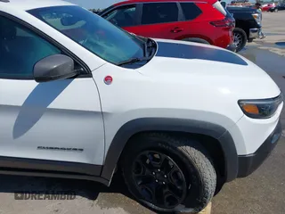 2021 Jeep Cherokee Trailhawk with VIN 1C4PJMBX1MD145169, listed as a IAAI auction lot 42340464 with 50,925 mi miles and . Bid and sale history available at DreamBid. Image 18.