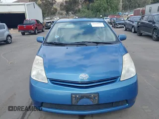 2005 Toyota Prius with VIN JTDKB20U957040822, listed as a IAAI auction lot 42129542 with 214,455 mi miles. Bid and sale history available at carsss.com. Image 6.