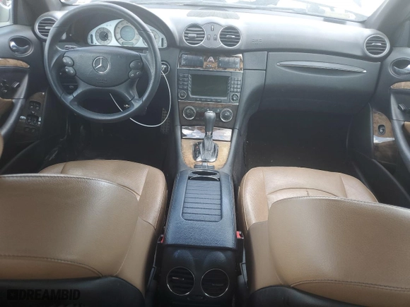 2009 Mercedes-Benz CLK-Class 5.5L with VIN WDBTK72F99T101596, listed as a Copart auction lot 65990194 with 108,640 mi miles and Salvage Title. Bid and sale history available at carsss.com. Image 8.