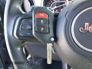 2019 Jeep Wrangler Unlimited Sport S with VIN 1C4HJXDN6KW686480, listed as a IAAI auction lot 41300842 with 67,359 mi miles and . Bid and sale history available at DreamBid. Image 11.