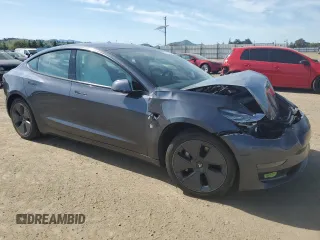 2022 Tesla Model 3 with VIN 5YJ3E1EA4NF244376, listed as a Copart auction lot 52142855 with Not Provided miles and Salvage Title. Bid and sale history available at DreamBid. Image 4.
