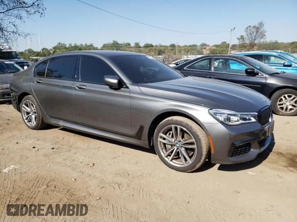 2019 BMW 7 Series 750i xDrive with VIN WBA7F2C50KB239939, listed as a Copart auction lot 71410423 with 52,428 mi miles. Bid and sale history available at carsss.com. Image 4.
