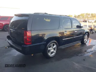 2010 Chevrolet Suburban LTZ with VIN 1GNUKKE37AR188966, listed as a IAAI auction lot 41833988 with 215,922 mi miles. Bid and sale history available at carsss.com. Image 4.