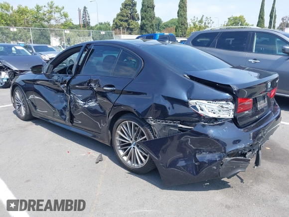 2018 BMW 5 Series 530i with VIN WBAJA5C51JG898278, listed as a IAAI auction lot 42595701 with 96,777 mi miles and . Bid and sale history available at DreamBid. Image 3.