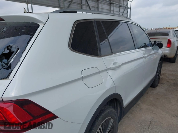 2018 Volkswagen Tiguan SEL with VIN 3VV2B7AX8JM120443, listed as a IAAI auction lot 42154773 with 70,256 mi miles and . Bid and sale history available at DreamBid. Image 20.