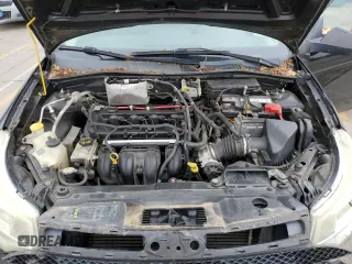 2009 Ford Focus SE z VIN 1FAHP35N69W138629, wystawiony jako Copart lot #58012605 z przebiegiem 155 557 mil mil oraz Szkoda całkowita • Salvage title. Historia ofert i sprzedaży dostępna na DreamBid. Obrazek 11.