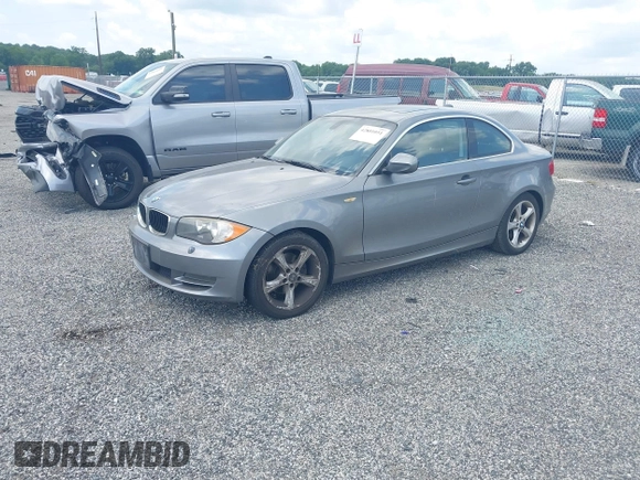 2011 BMW 1 Series 128i with VIN WBAUP9C57BVL90171, listed as a IAAI auction lot 42801051 with 150,148 mi miles and . Bid and sale history available at DreamBid. Image 2.