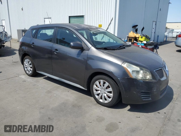 2009 Pontiac Vibe 1SB with VIN 5Y2SP67049Z458291, listed as a Copart auction lot 63234065 with 217,986 mi miles and Salvage title. Bid and sale history available at DreamBid. Image 4.