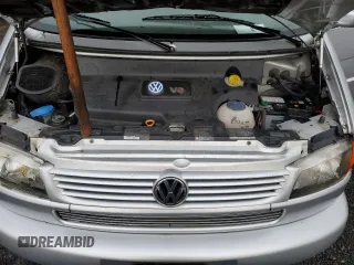 2001 Volkswagen EuroVan MV с VIN WV2MB47031H098986, выставлен на аукционе Copart как лот 77587294 с пробегом 161 046 миль миль и Чистый • Clean title. История ставок и продаж доступна на DreamBid. Изображение 12.
