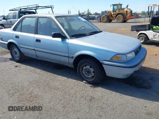 1990 Toyota Corolla with VIN 1NXAE97A0LZ129244, listed as a IAAI auction lot 42861579 with 329,572 mi miles and . Bid and sale history available at DreamBid. Image 1.