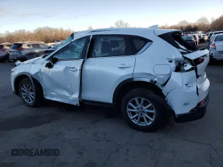 2023 Mazda CX-5 2.5 S with VIN JM3KFBAM6P0269481, listed as a Copart auction lot 87222194 with 21,070 mi miles and Salvage Title. Bid and sale history available at carsss.com. Image 2.