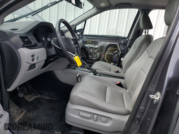 2020 Honda Pilot Touring 7-Passenger with VIN 5FNYF6H60LB039609, listed as a Copart auction lot 51753425 with 57,512 mi miles and Salvage title. Bid and sale history available at DreamBid. Image 7.