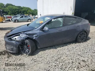 2022 Tesla Model Y Performance z VIN 7SAYGDEF1NF374891, wystawiony jako Copart lot #59870215 z przebiegiem 46 896 mil mil oraz Szkoda całkowita • Salvage title. Historia ofert i sprzedaży dostępna na DreamBid. Obrazek 1.
