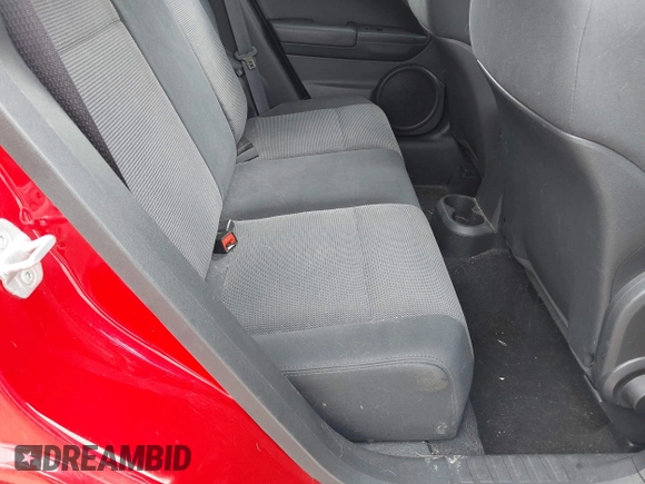 2011 Dodge Caliber Mainstreet z VIN 1B3CB3HA6BD209214, wystawiony jako IAAI lot #42185498 z przebiegiem 114 040 mil mil oraz . Historia ofert i sprzedaży dostępna na DreamBid. Obrazek 8.