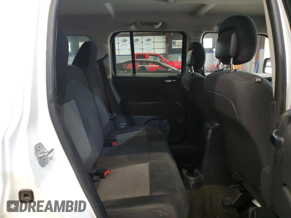 2014 Jeep Patriot Latitude with VIN 1C4NJRFB3ED766143, listed as a Copart auction lot 57879215 with 145,733 mi miles and Clean title. Bid and sale history available at DreamBid. Image 11.