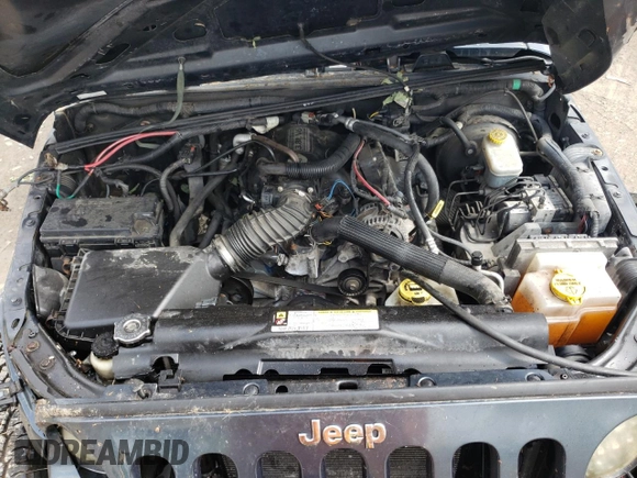 2008 Jeep Wrangler X with VIN 1J4FA24158L563572, listed as a Copart auction lot 58667265 with 162,649 mi miles and Salvage title. Bid and sale history available at DreamBid. Image 11.