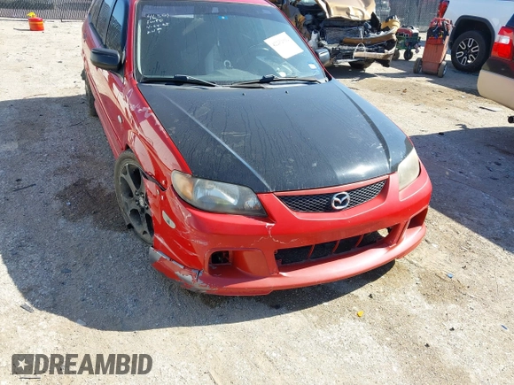 2002 Mazda Protege z VIN JM1BJ245221631014, wystawiony jako IAAI lot #42232912 z przebiegiem 180 184 mil mil oraz . Historia ofert i sprzedaży dostępna na DreamBid. Obrazek 1.