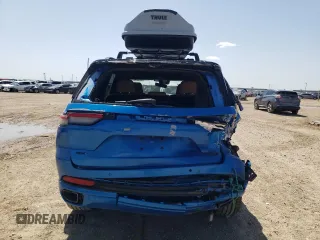 2023 Jeep Grand Cherokee Summit Reserve with VIN 1C4RJYE60P8881133, listed as a Copart auction lot 52354915 with 31,739 mi miles and Salvage title. Bid and sale history available at DreamBid. Image 6.