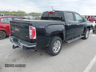 2016 GMC Canyon 4WD SLT z VIN 1GTG6DE36G1374639, wystawiony jako IAAI lot #42024354 z przebiegiem 61 752 mil mil oraz . Historia ofert i sprzedaży dostępna na DreamBid. Obrazek 4.