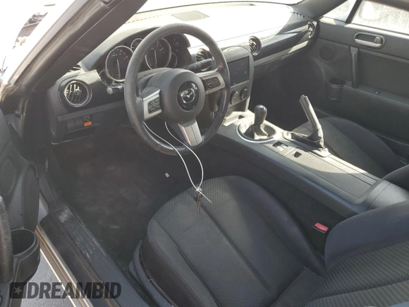 2007 Mazda MX-5 Miata Sport with VIN JM1NC25F470128936, listed as a Copart auction lot 45424585 with 123,910 mi miles and Salvage title. Bid and sale history available at DreamBid. Image 8.