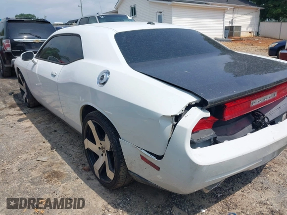 2012 Dodge Challenger SXT Plus z VIN 2C3CDYAG3CH168263, wystawiony jako IAAI lot #42283885 z przebiegiem 200 052 mil mil oraz . Historia ofert i sprzedaży dostępna na DreamBid. Obrazek 3.