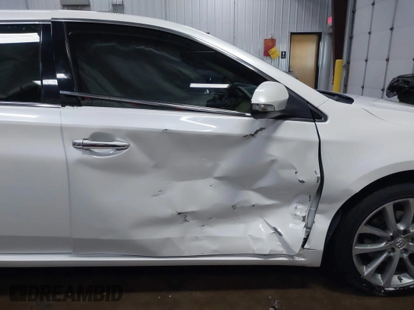 2014 Toyota Avalon Limited with VIN 4T1BK1EB6EU100635, listed as a IAAI auction lot 41609581 with 128,609 mi miles. Bid and sale history available at carsss.com. Image 6.