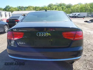 2013 Audi A8 3.0L with VIN WAURGAFD0DN005532, listed as a IAAI auction lot 42113540 with 176,635 mi miles and . Bid and sale history available at DreamBid. Image 16.