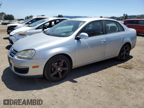 2009 Volkswagen Jetta S with VIN 3VWJZ71K39M149271, listed as a Copart auction lot 64703065 with 214,011 mi miles and Clean title. Bid and sale history available at DreamBid. Image 1.