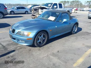 1996 BMW 3-Series Z3 with VIN 4USCH7320TLB75621, listed as a IAAI auction lot 41414858 with 96,609 mi miles. Bid and sale history available at carsss.com. Image 2.