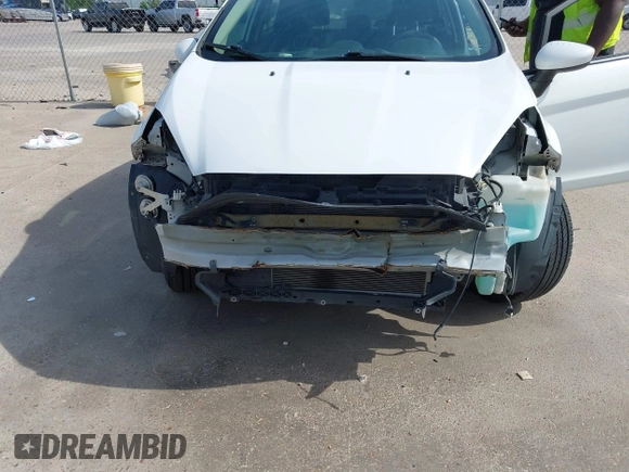 2017 Ford Fiesta SE z VIN 3FADP4BJ1HM126375, wystawiony jako IAAI lot #42244318 z przebiegiem 70 829 mil mil oraz . Historia ofert i sprzedaży dostępna na DreamBid. Obrazek 6.