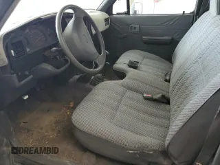 1994 Toyota Pickup DX z VIN 4TARN01P6RZ158609, wystawiony jako Copart lot #66612684 z przebiegiem 230 855 mil mil oraz Szkoda całkowita • Salvage title. Historia ofert i sprzedaży dostępna na DreamBid. Obrazek 7.