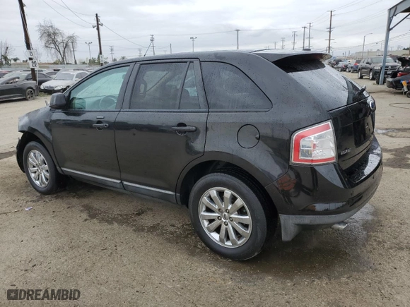 2010 Ford Edge SEL with VIN 2FMDK3JC7ABB58787, listed as a Copart auction lot 52556455 with 185,414 mi miles and Salvage Title. Bid and sale history available at carsss.com. Image 2.