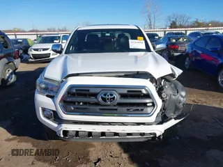 2016 Toyota Tacoma Limited with VIN 5TFEZ5CN4GX009513, listed as a IAAI auction lot 41363058 with 108,382 mi miles and . Bid and sale history available at DreamBid. Image 12.