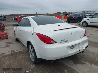 2007 Pontiac G6 GT with VIN 1G2ZH351674151077, listed as a IAAI auction lot 41946215 with 187,449 mi miles. Bid and sale history available at carsss.com. Image 3.