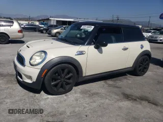 2009 MINI Hardtop S with VIN WMWMF73569TW80561, listed as a Copart auction lot 52615805 with 109,968 mi miles and Salvage title. Bid and sale history available at DreamBid. Image 1.